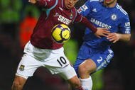 LONDON, ENGLAND - DECEMBER 20: Guillermo Franco of West Ham United is closed down by Branislav Ivanovic of Chelsea during the Barclays Premier League match between West Ham United and Chelsea at Upton Park on December 20, 2009 in London, England.  (Photo by Phil Cole/Getty Images)