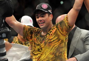 LOS ANGELES, CA - OCTOBER 24:  UFC Light Heavyweight Champion Lyoto Machida celebrates his victory over UFC Light Heavyweight challenger Mauricio Rua (not pictured) in their title fight at UFC 104 at Staples Center on October 24, 2009 in Los Angeles, California. Machida retained his title by way of unanimous decision.  (Photo by Jon Kopaloff/Getty Images)