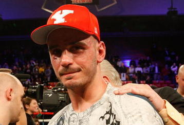 YOUNGSTOWN, OH - DECEMBER 19: Kelly Pavlik celebrates after defeating Miguel Espino for the World Middleweight Championship during their match on December 19, 2009 at the Beeghly Center in Youngstown, Ohio.  (Photo by Jared Wickerham/Getty Images)