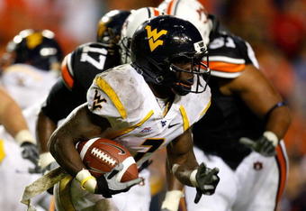 AUBURN, AL - SEPTEMBER 19:  Noel Devine #7 of the West Virginia Mountaineers against the Auburn Tigers at Jordan-Hare Stadium on September 19, 2009 in Auburn, Alabama.  (Photo by Kevin C. Cox/Getty Images)