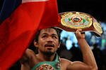 LAS VEGAS - NOVEMBER 14:  Manny Pacquiao celebrates his 12 round TKO victory against Miguel Cotto during their WBO welterweight title fight at the MGM Grand Garden Arena on November 14, 2009 in Las Vegas, Nevada.  (Photo by Al Bello/Getty Images)