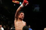 LAS VEGAS - SEPTEMBER 16:  Israel Vazquez celebrates after defeating Jhonny Gonzalez after their WBC super bantamweight titile fight at the MGM Grand Garden Arena September 16, 2006 in Las Vegas, Nevada. Vazquez retained his title after defeating Gonzalez by TKO in the 10th round.  (Photo by Ethan Miller/Getty Images)