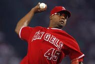 BOSTON - OCTOBER 5: Kelvim Escobar #45 of the Los Angeles Angels throws against the Boston Red Sox during Game 2 of the American League Division Series at Fenway Park October 5, 2007 in Boston, Massachusetts. (Photo by Jim Rogash/Getty Images)