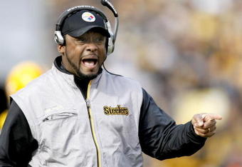 PITTSBURGH - DECEMBER 27:  Head coach Mike Tomlin of the Pittsburgh Steelers reacts to a play while playing the Baltimore Ravens on December 27, 2009 at Heinz Field in Pittsburgh, Pennsylvania. Pittsburgh won the game 23-20.  (Photo by Gregory Shamus/Getty Images)
