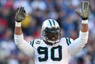 EAST RUTHERFORD, NJ - DECEMBER 27: Julius Peppers #90 of the Carolina Panthers against the New York Giants at Giants Stadium on December 27, 2009 in East Rutherford, New Jersey.  (Photo by Nick Laham/Getty Images)