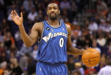 PHOENIX - DECEMBER 19:  Gilbert Arenas #0 of the Washington Wizards hanldles the ball during the NBA game against the Phoenix Suns at US Airways Center on December 19, 2009 in Phoenix, Arizona. The Suns defeated the Wizards 121-95. NOTE TO USER: User expressly acknowledges and agrees that, by downloading and or using this photograph, User is consenting to the terms and conditions of the Getty Images License Agreement.  (Photo by Christian Petersen/Getty Images)