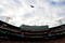 BOSTON - JANUARY 01:  A military flyover occurs at the start of the game between the Philadelphia Flyers and the Boston Bruins during the 2010 Bridgestone Winter Classic at Fenway Park on January 1, 2010 in Boston, Massachusetts.  (Photo by Elsa/Getty Images)