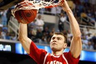GREENSBORO, NC - MARCH 19:  Artsiom Parakhouski #45 of the Radford Highlanders dunks against the North Carolina Tar Heels during the first round of the NCAA Division I Men's Basketball Tournament at the Greensboro Coliseum on March 19, 2009 in Greensboro, North Carolina.  (Photo by Streeter Lecka/Getty Images)