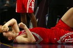 LOS ANGELES, CA - MAY 04:  Yao Ming #11 of the Houston Rockets reacts in pain after injuring his knee in the fourth quarter against the Los Angeles Lakers in Game One of the Western Conference Semifinals during the 2009 NBA Playoffs at Staples Center on May 4, 2009 in Los Angeles, California. Ming returned to the game later in the quarter. NOTE TO USER: User expressly acknowledges and agrees that, by downloading and or using this photograph, User is consenting to the terms and conditions of the Getty Images License Agreement.  (Photo by Jeff Gross/Getty Images)