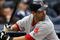 NEW YORK - SEPTEMBER 26:  Mike Lowell #25 of the Boston Red Sox bats against the New York Yankees on September 26, 2009 at Yankee Stadium in the Bronx borough of New York City.  (Photo by Jim McIsaac/Getty Images)