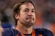 DENVER - JANUARY 03: Quarterback Kyle Orton #8 of the Denver Broncos looks on from the bench against the Kansas City Chiefs during NFL action at Invesco Field at Mile High on January 3, 2010 in Denver, Colorado. Orton threw three interceptions as the Chiefs defeated the Broncos 44-24. (Photo by Doug Pensinger/Getty Images)