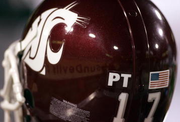 TEMPE, AZ - NOVEMBER 13:  A Washington State Cougars helmet showing the initials of Pat Tillman next to the American flag during the Arizona State Sun Devils against Washington State Cougars Pac-10 game at Sun Devil Stadium/Frank Kush Field on November 13, 2004 in Tempe, Arizona. (Photo by Donald Miralle/Getty Images)