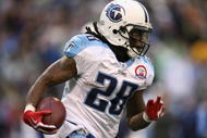 SEATTLE - JANUARY 03:  Running back Chris Johnson #28 of the Tennessee Titans rushes against the Seattle Seahawks on January 3, 2010 at Qwest Field in Seattle, Washington. The Titans defeated the Seahawks 17-13. (Photo by Otto Greule Jr/Getty Images)