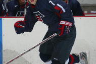 LAKE PLACID, NY - AUGUST 08: John Carlson #7 of Team USA skates against Team Finland at the USA Hockey National Junior Evaluation Camp on August 8, 2008 at the Olympic Center in Lake Placid, New York.  (Photo by Bruce Bennett/Getty Images)