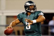 ARLINGTON, TX - JANUARY 03:  Quarterback Donovan McNabb #5 of the Philadelphia Eagles throws against the Dallas Cowboys at Cowboys Stadium on January 3, 2010 in Arlington, Texas.  (Photo by Ronald Martinez/Getty Images)