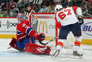 MONTREAL - JANUARY 24:  Carey Price of the Montreal Canadiens makes a save against Michael Frolik of the Florida Panthers during the 'Upper Deck YoungStars Game' during the Honda NHL Superskills competition as part of the 2009 NHL All-Star weekend on January 24, 2009 at the Bell Centre in Montreal, Canada.  (Photo by Dave Sandford/Getty Images)