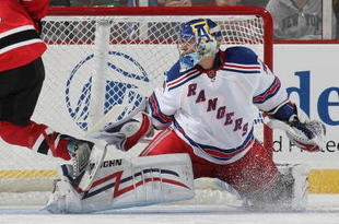 NEWARK, NJ - SEPTEMBER 16: Zach Parise #9 of the New Jersey Devils  scores in the shootout against Chad Johnson #96 of the New York Rangers at the Prudential Center on September 16, 2009 in Newark, New Jersey. The Devils defeated the Rangers 3-2 in the shoot out. (Photo by Bruce Bennett/Getty Images)