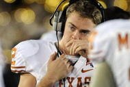 PASADENA, CA - JANUARY 07:  Quarterback Colt McCoy #12 of the Texas Longhorns looks on during the sideline in the fourth quarter against the Alabama Crimson Tide in the Citi BCS National Championship game at the Rose Bowl on January 7, 2010 in Pasadena, California.  McCoy left the game in the first quarter due to injury.  (Photo by Harry How/Getty Images)