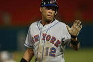 MIAMI - JULY 7:  Infielder Roberto Alomar #12 of the New York Mets looks on against the Florida Marlins during the game on July 7, 2002 at Pro Player Stadium in Miami, Florida.  The Mets won 9-3.  (Photo By Eliot J. Schechter/Getty Images)