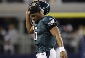 ARLINGTON, TX - JANUARY 9:  Quarterback Donovan McNabb #5 of the Philadelphia Eagles walks off the field after not converting on fourth down in the second half during the 2010 NFC wild-card playoff game against the Dallas Cowboys at Cowboys Stadium on January 9, 2010 in Arlington, Texas. (Photo by Jamie Squire/Getty Images)