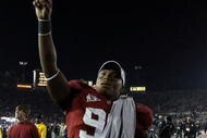 PASADENA, CA - JANUARY 07:  Luther Davis #96 of the Alabama Crimson Tide celebrates after winning the Citi BCS National Championship game over the Texas Longhorns at the Rose Bowl on January 7, 2010 in Pasadena, California. The Crimson Tide defeated the Longhorns 37-21.  (Photo by Stephen Dunn/Getty Images)