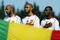 MONASTIR, TUNISIA - FEBRUARY 13:  Frederic Oumar Kanoute of Mali (C) lines up for the Mali national anthem before the African Nations Cup 2004 3rd/4th Play-off match between Mali and Nigeria at the Mustapha Ben Jannet Stadium on February 13, 2004 in Monastir, Tunisia.  (Photo by Shaun Botterill/Getty Images)