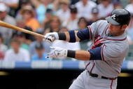 DENVER - JULY 12: Ryan Church #25 of the Atlanta Braves takes an at bat against the Colorado Rockies during MLB action at Coors Field on July 12, 2009 in Denver, Colorado. The Rockies defeated the Braves 8-7. (Photo by Doug Pensinger/Getty Images)