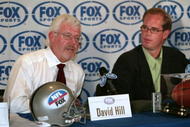 Chairman & CEO Fox Sports Televsion David Hill, on left, and Joe Buck during a press conference to announce the new NFL on Fox lead broadcast team at the News Corp Building in New York City.  5/2/02  Photo by Scott Gries/ImageDirect