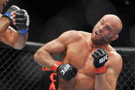 PORTLAND, OR - AUGUST 29: UFC fighter Antonio Nogueira (L) battles UFC fighter Randy Couture (R) during their Heavyweight bout at UFC 102: Couture vs. Nogueira at the Rose Garden Arena on August 29, 2009 in Portland, Oregon. (Photo by Jon Kopaloff/Getty Images)