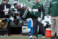 EAST RUTHERFORD, NJ - NOVEMBER 29: Darrelle Revis #24 of the New York Jets intercepts a pass intended for Steve Smith #89 of the Carolina Panthers during the second quarter on November 29, 2009 at Giants Stadium in East Rutherford, New Jersey. (Photo by Jim McIsaac/Getty Images)