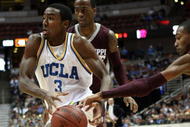 ANAHEIM, CA - DECEMBER 12:  Malcolm Lee #3 of the UCLA Bruins has the ball stropped by Barry Steward #22 of the Mississippi State Bulldogs in the John Wooden Classic on December 12, 2009 at the Honda Center in Anaheim, California. (Photo by Stephen Dunn/Getty Images)