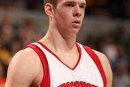 INDIANAPOLIS - MARCH 13:  Jon Leuer #30 of the Wisconsin Badgers looks on against the Ohio State Buckeyes during the second round of the Big Ten Men's Basketball Tournament at Conseco Fieldhouse on March 13, 2009 in Indianapolis, Indiana.  (Photo by Jonathan Daniel/Getty Images)