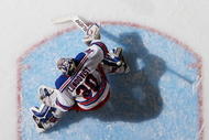UNIONDALE, NY - DECEMBER 17:  Henrik Lundqvist #30 of the New York Rangers tends net against the New York Islanders at the Nassau Coliseum on December 17, 2009 in Uniondale, New York.  (Photo by Bruce Bennett/Getty Images)