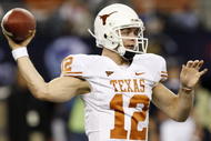 ARLINGTON, TX - DECEMBER 5: Quarterback Colt McCoy #12 of the Texas Longhorns passes the ball against the Nebraska Cornhuskers at Cowboys Stadium on December 5, 2009 in Arlington, Texas. (Photo by Ronald Martinez/Getty Images)
