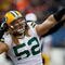 CHICAGO - DECEMBER 13: Clay Matthews #52 of the Green Bay Packers celebrates a sack against Jay Cutler of the Chicago Bears at Soldier Field on December 13, 2009 in Chicago, Illinois. (Photo by Jonathan Daniel/Getty Images)