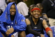 10 Feb 2002: Tracy McGrady #1 of the Orlando Magic and Allen Iverson #3 of the Philadelphia 76''ers and the Eastern Conference team share a laugh on the bench during the NBA All-Star game at the First Union Center in Philadelphia, Pennsylvania. The West team won 135-120. Digital Image Mandatory Credit: Andy Lyons/Getty Images