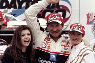 DAYTONA BEACH - FEBRUARY 15:  Dale Earnhardt Sr. driver of the #3 GM Goodwrench Chevrolet and wife Teresa celebrate victory with the trophy after the Nascar Daytona 500 on February 15, 1998 at the Daytona International Speedway in Daytona Beach, Florida. (Photo by David Taylor/Getty Images)
