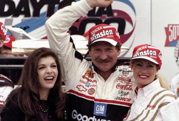 DAYTONA BEACH - FEBRUARY 15:  Dale Earnhardt Sr. driver of the #3 GM Goodwrench Chevrolet and wife Teresa celebrate victory with the trophy after the Nascar Daytona 500 on February 15, 1998 at the Daytona International Speedway in Daytona Beach, Florida. (Photo by David Taylor/Getty Images)