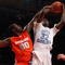 NEW YORK - NOVEMBER 20:  Ed Davis #32 of the North Carolina Tar Heels is fouled by Rick Jackson #00 of the Syracuse Orange during the championship game of the 2K Sports Classic on November 20, 2009 at Madison Square Garden in New York City.  (Photo by Jim McIsaac/Getty Images)