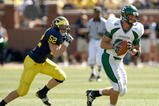 ANN ARBOR, MI - SEPTEMBER 19:  Tight end Ben Thayer #81 of the Eastern Michigan Eagles carries the ball as he is chased by lilnebacker Kevin Leach #52 of the Michigan Wolverines at Michigan Stadium on September 19, 2009 in Ann Arbor, Michigan.  Michigan won 45-17.  (Photo by Stephen Dunn/Getty Images)