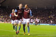 SUNDERLAND, ENGLAND - DECEMBER 15: James Milner of Aston Villa celebrates scoring with Gabriel Agbonlahor during the Barclays Premier League match between Sunderland and Aston Villa at the Stadium of Light on December 15, 2009 in Sunderland, England. (Photo by Michael Regan/Getty Images)