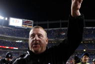 DENVER - DECEMBER 20:  Oakland Raiders head coach Tom Cable celebrates a victory over the Denver Broncos at Invesco Field at Mile High on December 20, 2009 in Denver, Colorado. The Raiders defeated the Broncos 20-19.  (Photo by Jeff Gross/Getty Images)