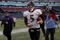 FOXBORO, MA - JANUARY 10:  Quarterback Joe Flacco #5 of the Baltimore Ravens celebrates as he walks off of the field after their 33-14 win against the New England Patriots during the 2010 AFC wild-card playoff game at Gillette Stadium on January 10, 2010 in Foxboro, Massachusetts.  (Photo by Jim Rogash/Getty Images)