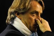 LIVERPOOL, ENGLAND - JANUARY 16: Manchester City Manager Roberto Mancini looks on during the Barclays Premier League match between Everton and Manchester City at Goodison Park on January 16, 2010 in Liverpool, England. (Photo by Michael Regan/Getty Images)