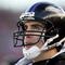 FOXBORO, MA - JANUARY 10:  Quarterback Joe Flacco #5 of the Baltimore Ravens looks on against the New England Patriots during the 2010 AFC wild-card playoff game at Gillette Stadium on January 10, 2010 in Foxboro, Massachusetts. The Ravens won 33-14.  (Photo by Jim Rogash/Getty Images)