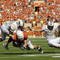 AUSTIN, TX - NOVEMBER 07:  Tight end Greg Smith #83 of the Texas Longhorns runs with a catch against the UCF Knights on November 7, 2009 at Darrell K Royal - Texas Memorial Stadium in Austin, Texas.  Texas won 35-3.  (Photo by Brian Bahr/Getty Images)