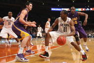NEW YORK - NOVEMBER 25: Stanley Robinson #21 of the Connecticut Huskies dribbles the ball against the LSU Tigers at Madison Square Garden on November 25, 2009 in New York, New York. (Photo by Nick Laham/Getty Images)