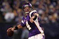 MINNEAPOLIS - JANUARY 17:  Quarterback Brett Favre #4 of the Minnesota Vikings throws a pass against the Dallas Cowboys during the fourth quarter of the NFC Divisional Playoff Game at Hubert H. Humphrey Metrodome on January 17, 2010 in Minneapolis, Minnesota.  The Vikings defeated the Cowboys 34-3.  (Photo by Chris McGrath/Getty Images)