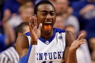 LEXINGTON, KY - JANUARY 02: John Wall #11 of the Kentucky Wildcats celebrates during the game against the Louisville Cardinals at Rupp Arena on January 2, 2010 in Lexington, Kentucky. Kentucky won 71-62. (Photo by Andy Lyons/Getty Images)