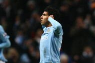 MANCHESTER, ENGLAND - JANUARY 19: Carlos Tevez of Manchester City gestures after scoring his team's second goal during the Carling Cup Semi Final match between Manchester City and Manchester United at the City of Manchester Stadium on January 19, 2010 in Manchester, England. (Photo by Alex Livesey/Getty Images)
